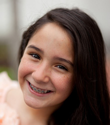 smiling girl with braces